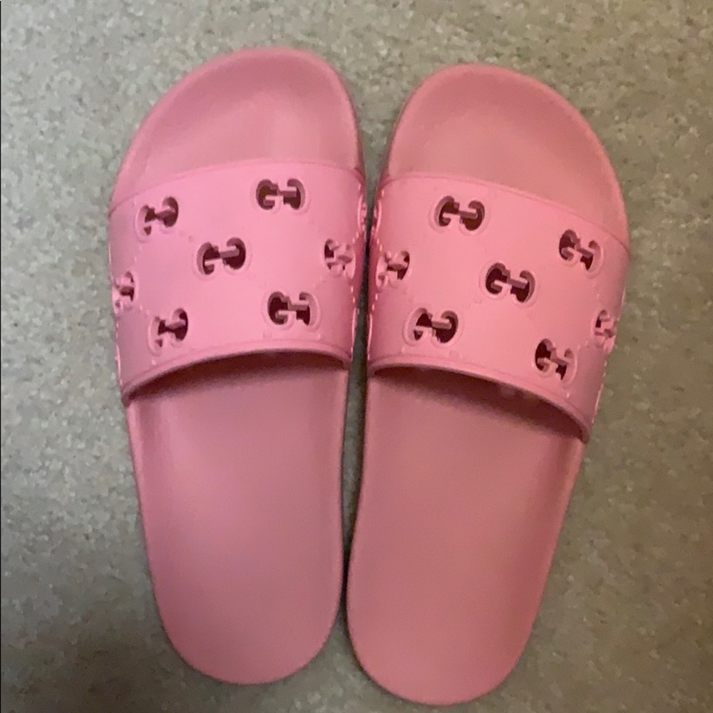Authentic GUCCI rubber GG slide sandal.